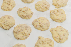 Sweet Belgian white chocolate toffee clusters with a buttery crunch