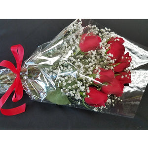 Fresh long-stem roses prepared for Valentine's Day pickup at our Virginia Beach boutique.